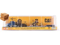 DIECAST MASTERS #84424-BOX - Kenworth T880 in Blue with Lowboy Trailer and Caterpillar Padfoot Roller