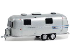 34140-E - Greenlight Diecast 1973 Airstream Ambassador International Land Yacht Hitched