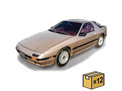 IXO AMERICA #U64RDC017-JC-CASE - 1986 Mazda RX-7 GXL in Satin Gold Metallic