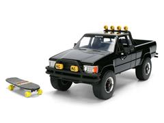 JADA TOYS #36479 - Martys 1985 Toyota SR5 Pickp with Skateboard