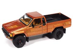 JOHNNY LIGHTNING #JLCG034-B-1 - 1985 Toyota SR5 Pickup in Bright Gold Poly with Brown Stripes