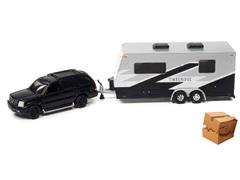 JOHNNY LIGHTNING #JLSP201-B-BOX - 2005 Cadillac Escalade in Matte Black with Camper Trailer